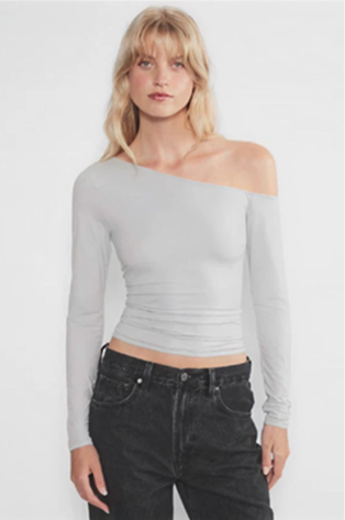 Person wearing green earrings